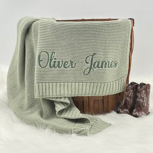 Sage knit baby blanket embroidered with the name Oliver James