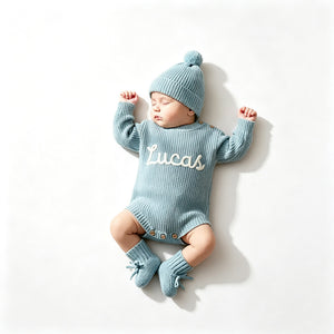 Gray blue knit baby romper embroidered with the name Lucas