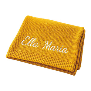 Mustard knit baby blanket embroidered with Ella Maria
