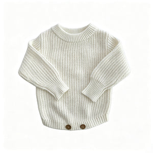 White knit baby romper with classic straight hem