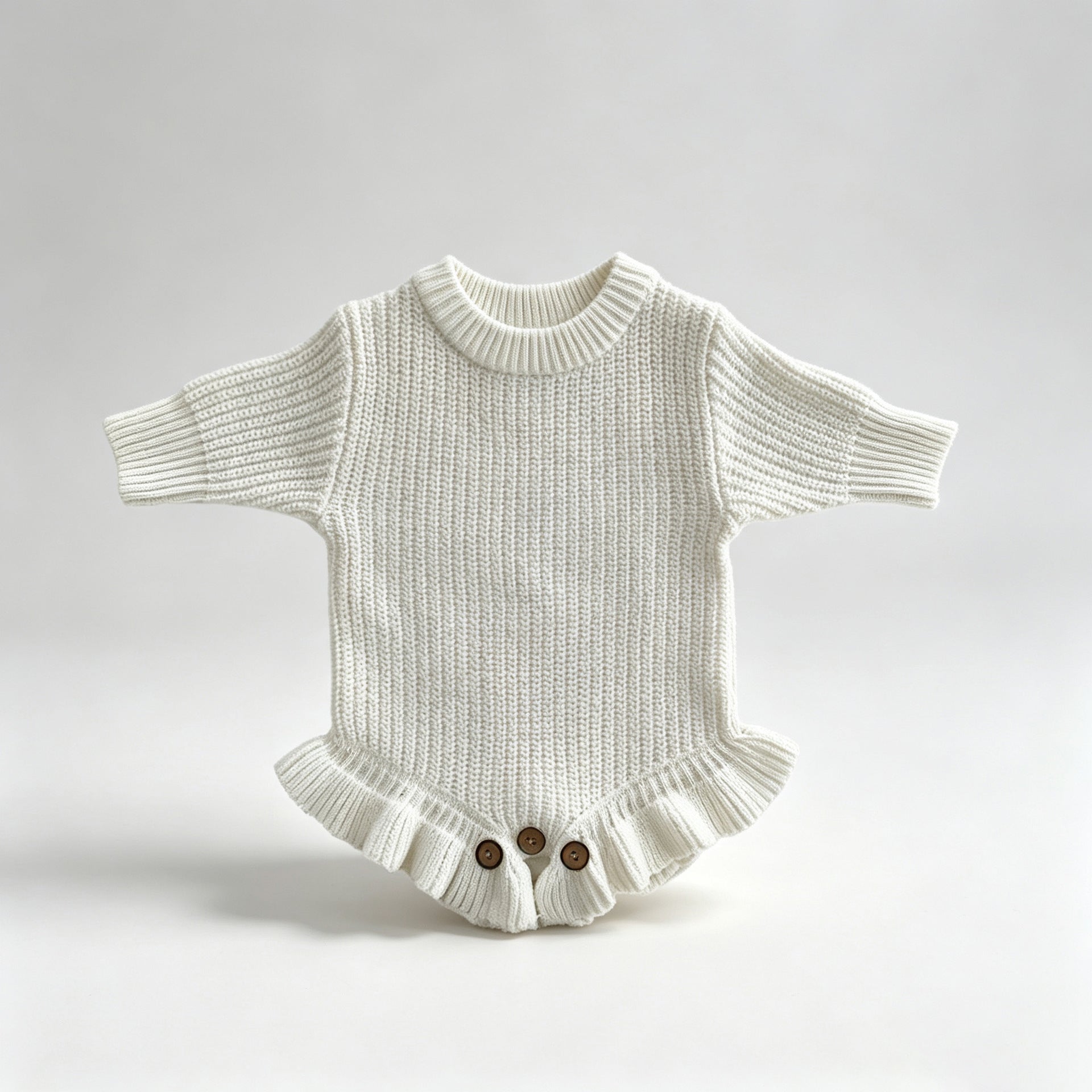 White – Ruffle Hem knit baby romper