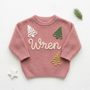 Personalized baby Christmas sweater, hand embroidered outline Christmas trees, flat lay