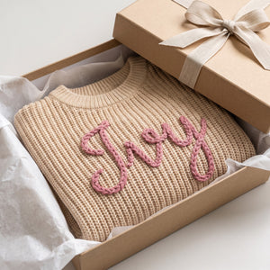 Personalized kids sweater in a gift box