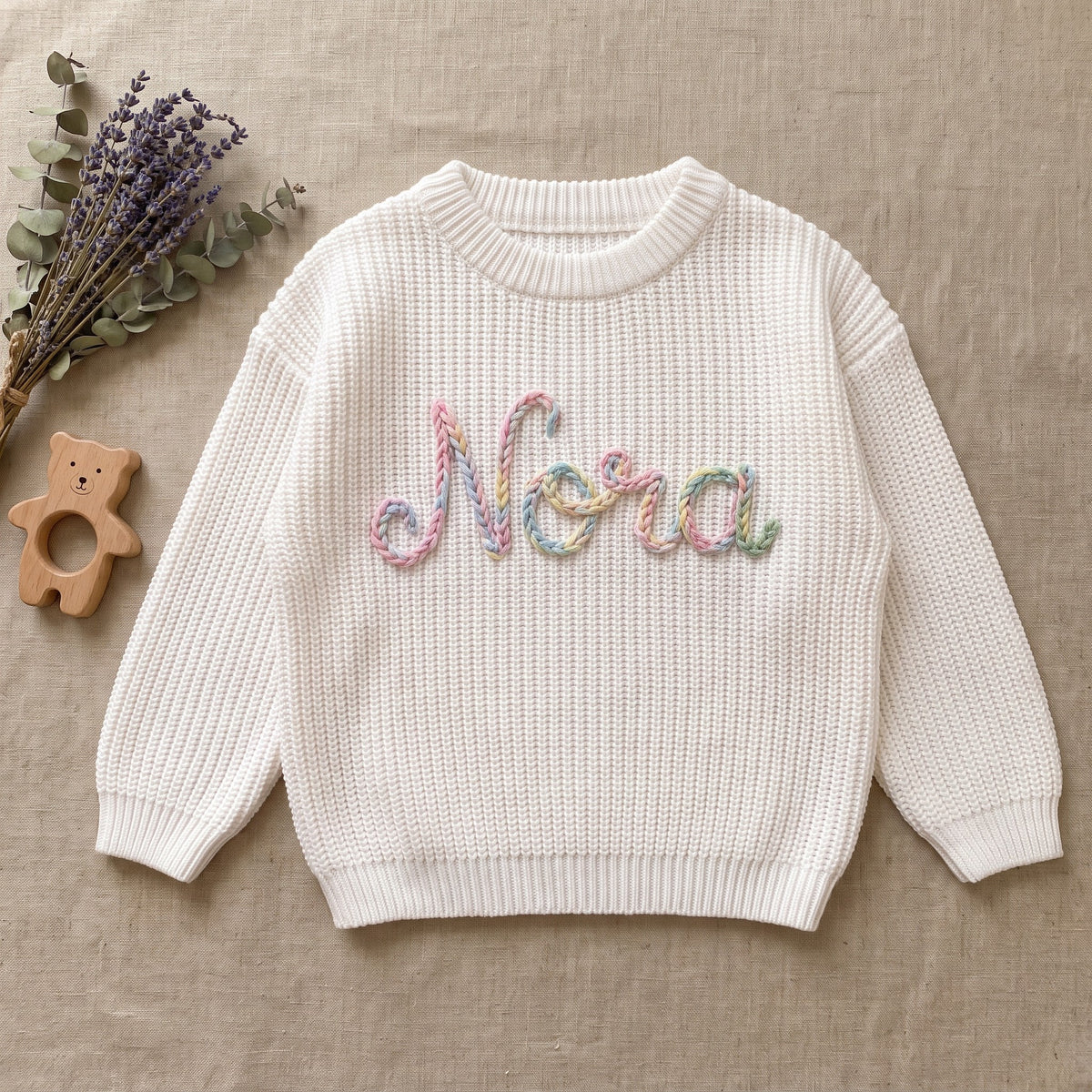 Personalized Children's Sweater โ flat lay
