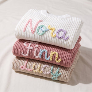Hand embroidered name sweaters in three knit colors