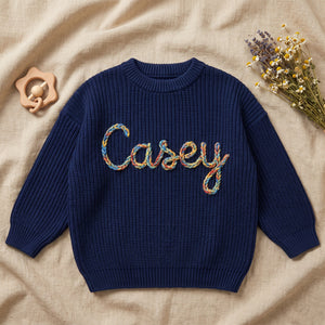 Personalized Kids Name Jumper – flat lay