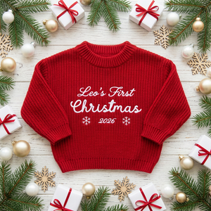 Machine embroidered first Christmas script baby Christmas sweater among Christmas decorations