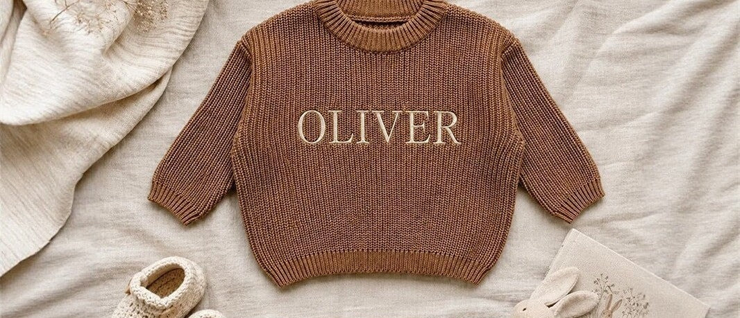 Brown chunky knit kids sweater embroidered with the name Oliver