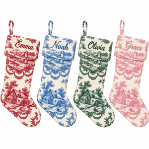 Set of four personalized toile Christmas stockings with matching toile cuff in red, blue, dark green and pink