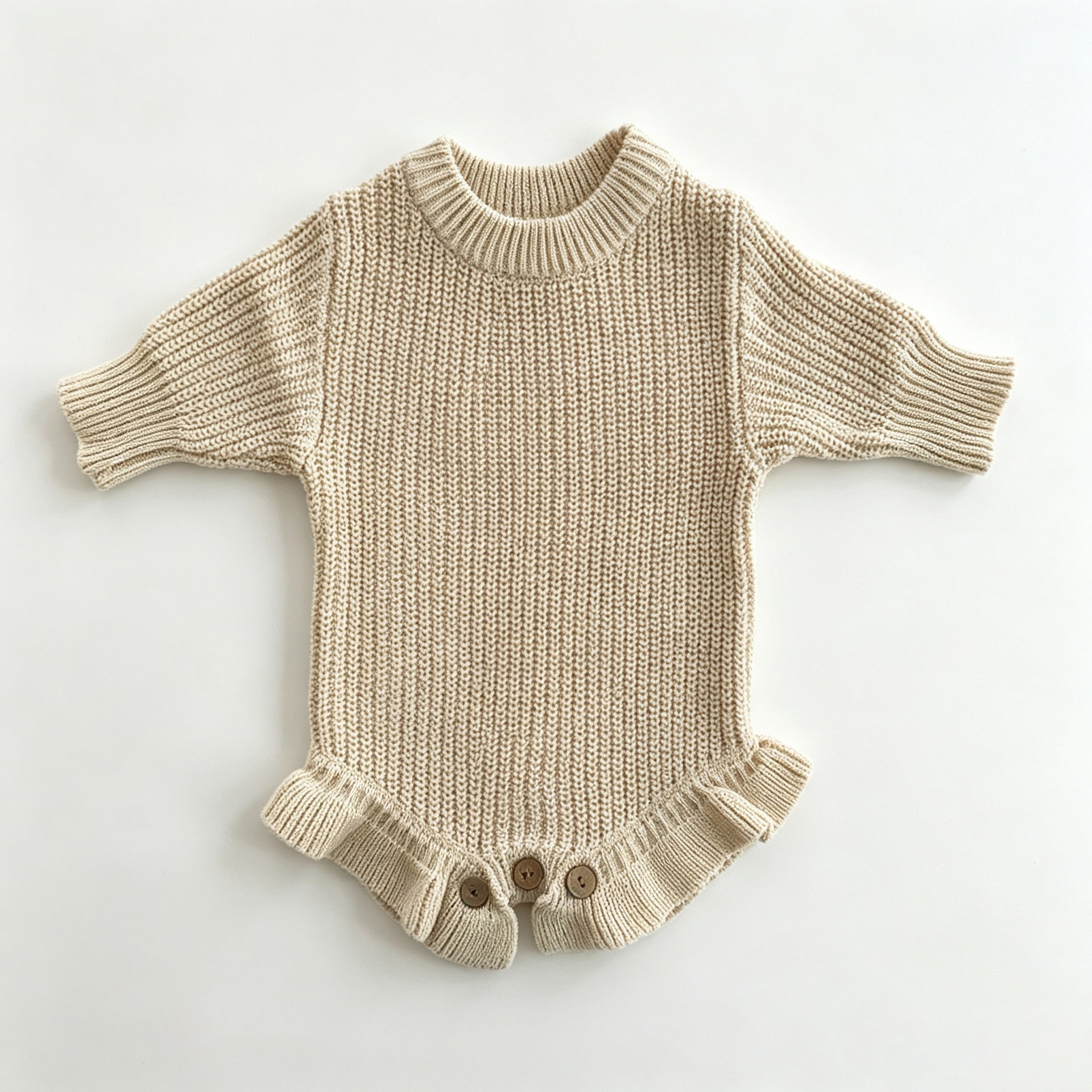 Apricot knit baby romper with ruffle hem