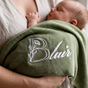 Sage ruffle blanket embroidered with a Blair monogram