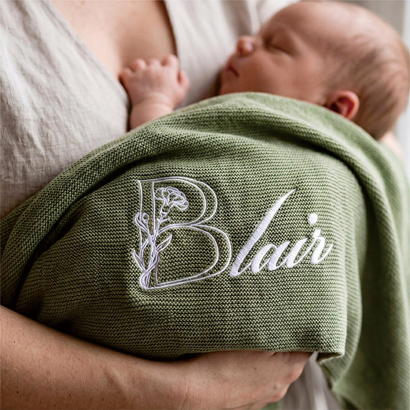 Sage ruffle blanket embroidered with a Blair monogram