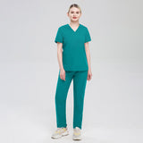 Nian Qing high quality solid color male and female surgeon uniforms, nurse uniforms, short sleeve surgical pets, hospital clinic overalls