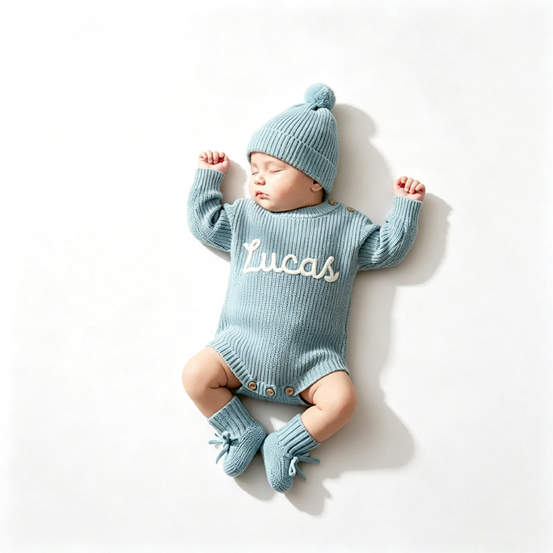 Gray blue knit baby romper embroidered with the name Lucas