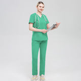 Nian Qing high quality solid color male and female surgeon uniforms, nurse uniforms, short sleeve surgical pets, hospital clinic overalls