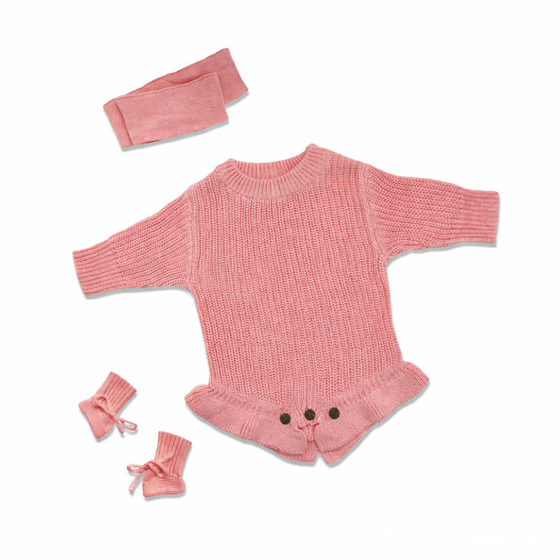 Pink ruffle knit baby romper with matching headband and booties