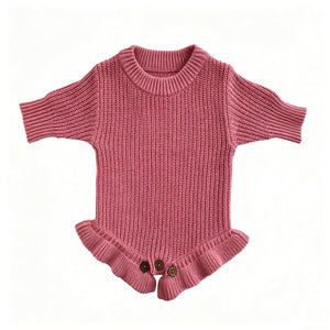 Rose pink knit baby romper with ruffle hem
