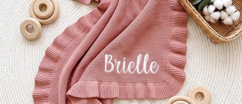 Rose pink ruffle knit blanket embroidered with Brielle