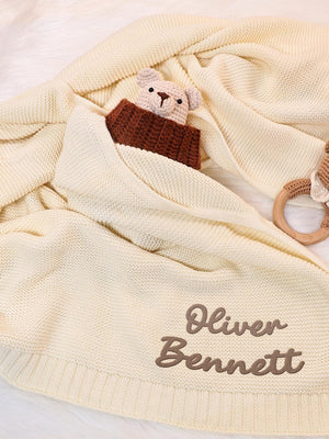 Cream knit blanket embroidered with Oliver Bennett