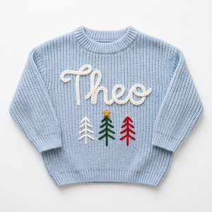 Hand embroidered three Christmas trees Christmas sweater on a plain background