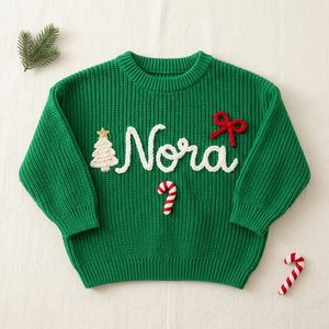 Personalized baby Christmas sweater, hand embroidered Christmas tree, bow & candy cane, flat lay