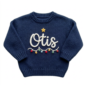 Hand embroidered Christmas string lights Christmas sweater on a plain background