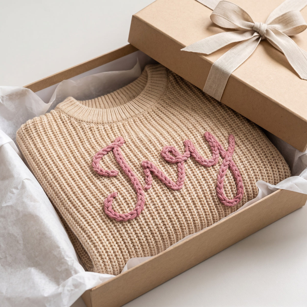 Personalized kids sweater in a gift box