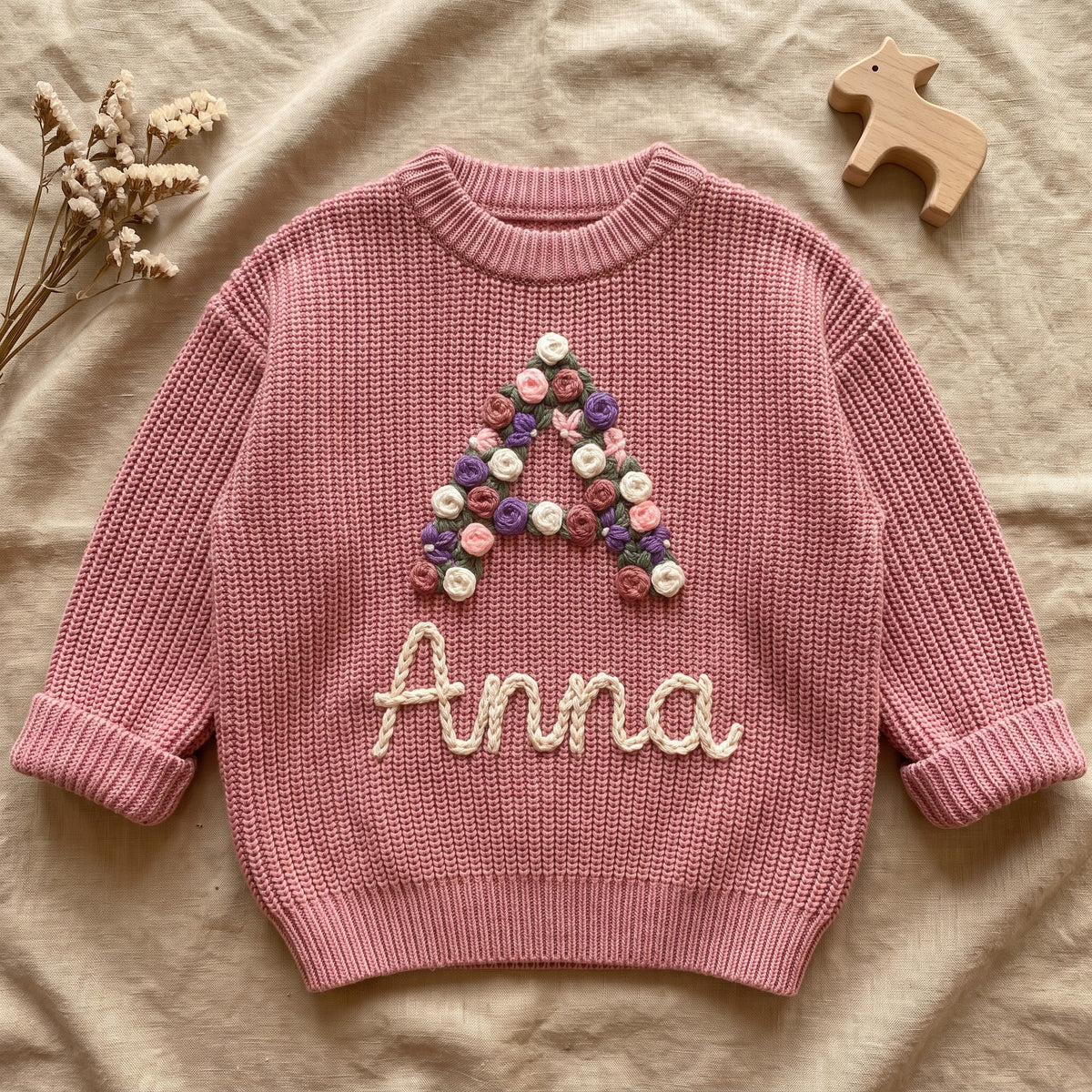Personalized Initial & Name Kids Sweater – flat lay