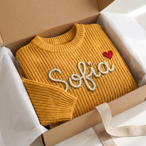 Personalized kids sweater in a gift box