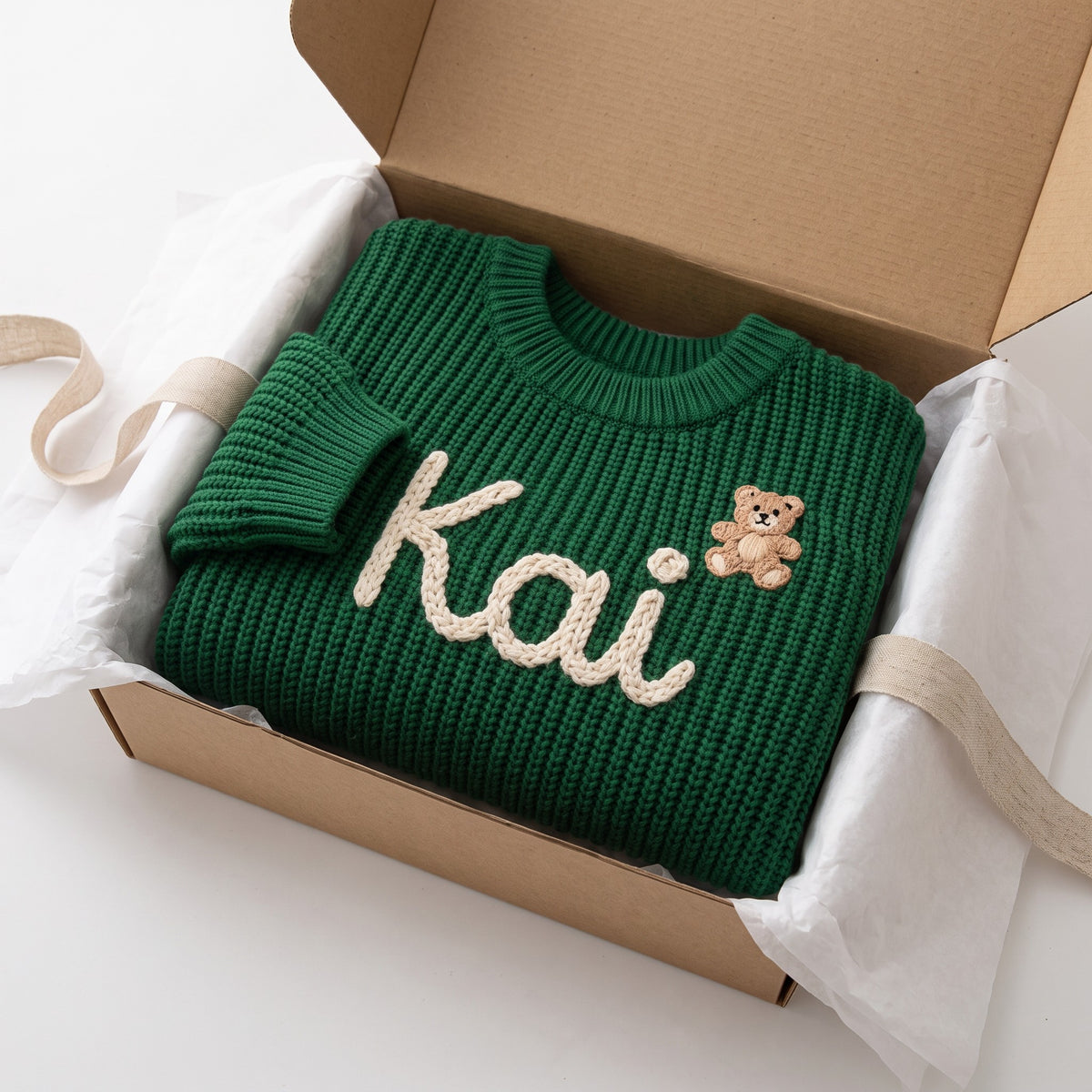 Personalized kids sweater in a gift box