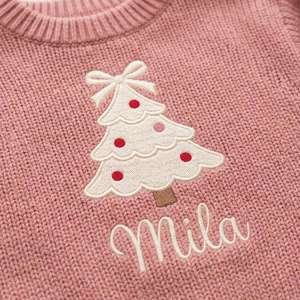 Close-up of machine embroidered coquette Christmas tree on chunky knit