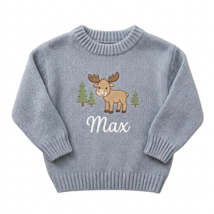 Machine embroidered moose & Christmas trees baby Christmas sweater on a plain background