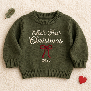 Machine embroidered first Christmas with bow baby Christmas sweater, flat lay