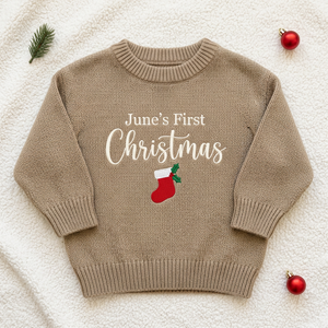 Machine embroidered first Christmas stocking baby Christmas sweater, flat lay