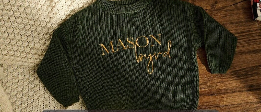 Dark green knit sweater embroidered with Mason Boyd